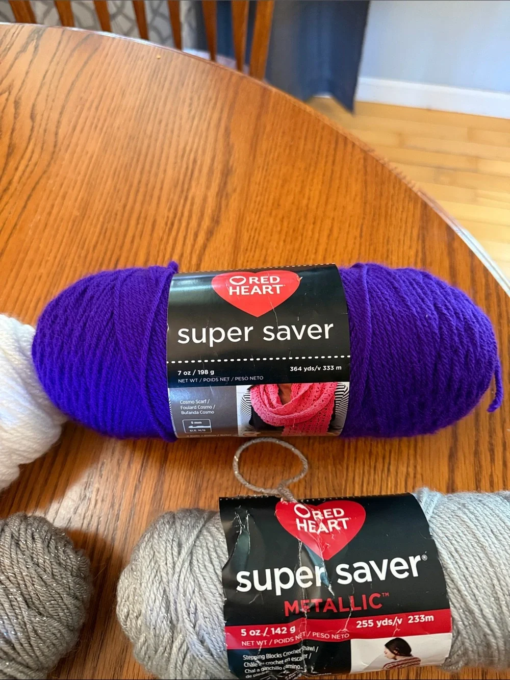 Super Saver Yarn Bundle in Purple, Black, white, gray metallic, and brown.